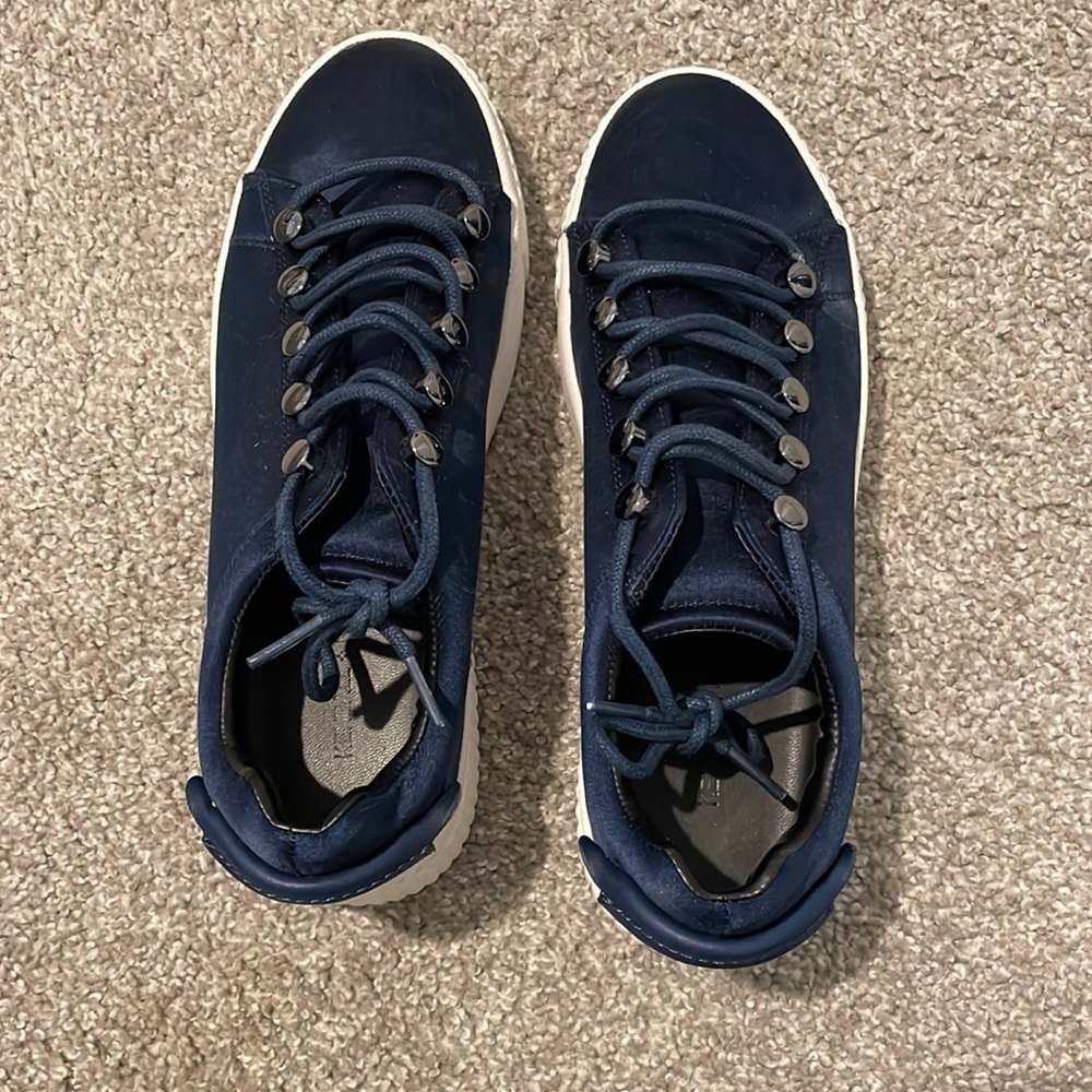 Kendall + Kylie blue lace sneakers.